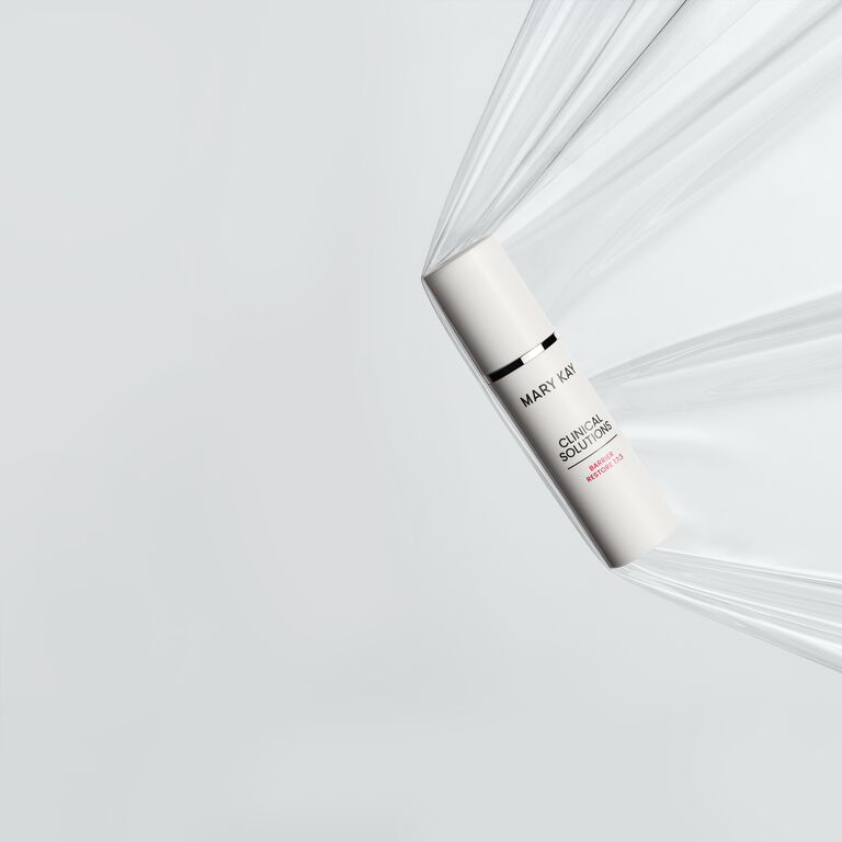 Mary Kay Clinical Solutions product displayed on a soft white background with sheer fabric accents.