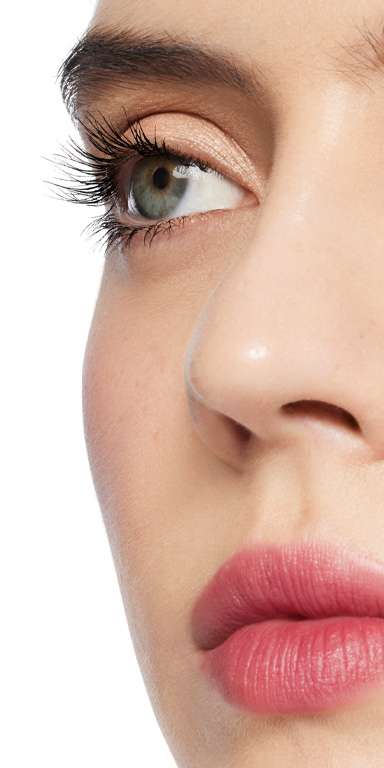 Close up of model's eyelashes after 3 coats of Mary Kay Great Heights Mascara